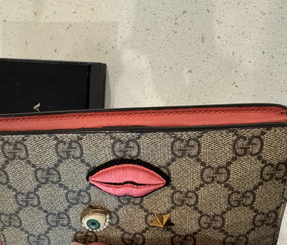 Gucci GG Supreme Monogram Embroidered Face Wristlet